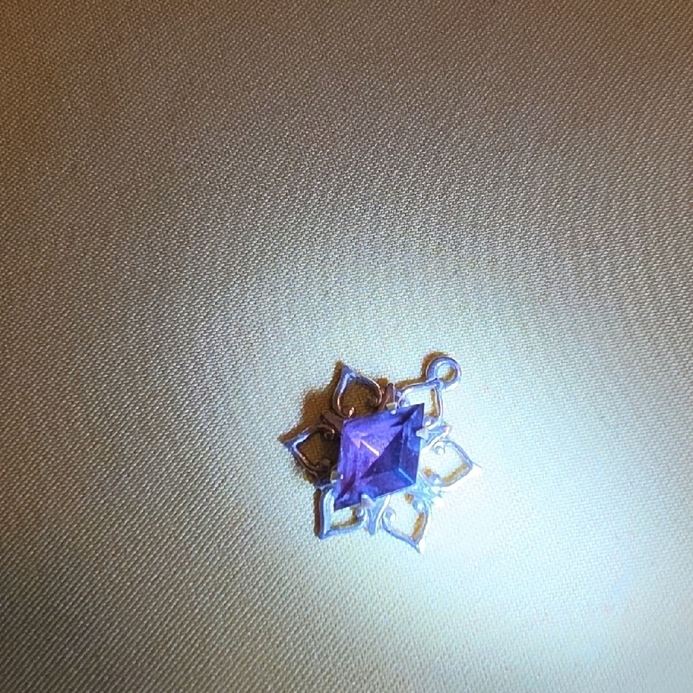 Vintage, Likely Amethyst, Pendant Featuring a Central Faceted Purple Gemstone